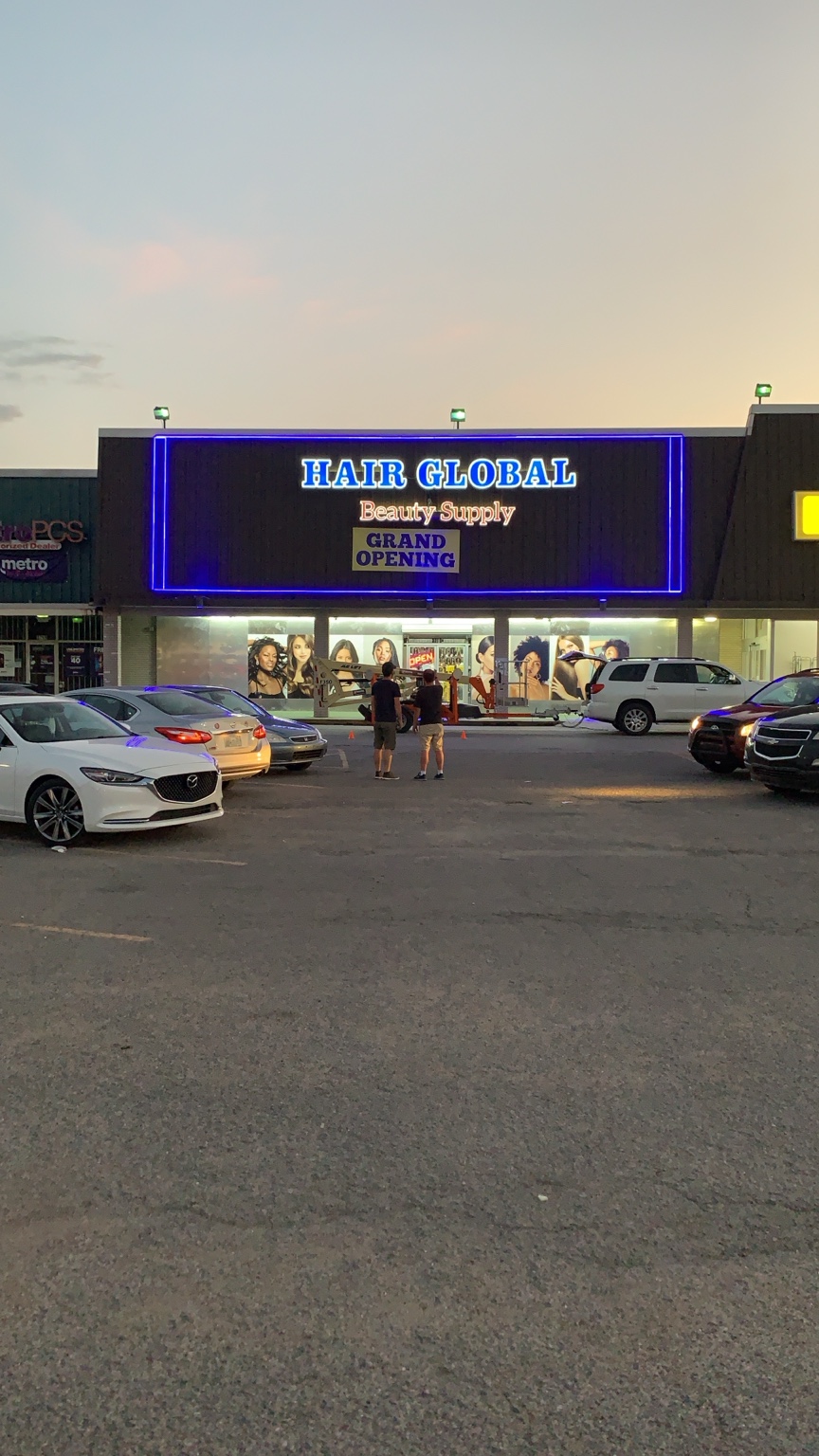 Hair Global Beauty Supply storefront at night